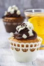 Fancy chocolate cupcakes on wooden table Royalty Free Stock Photo