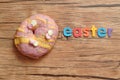 A fancy decorated doughnut with the word easter Royalty Free Stock Photo