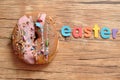 A fancy decorated doughnut with the word easter Royalty Free Stock Photo