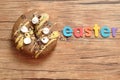 A fancy decorated doughnut with the word easter Royalty Free Stock Photo