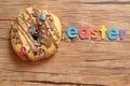 A fancy decorated doughnut with the word easter Royalty Free Stock Photo
