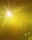 Fancy gold background blur with yellow sun ray streaks of light and blurred bokeh circles