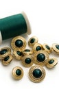 Fancy Green and Gold Sewing Buttons Royalty Free Stock Photo
