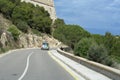 Fancy hippie car on a curly road to Ibiza Castle, Spain