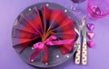 Fancy pink and purple table setting with fan shape napkin - aerial Royalty Free Stock Photo