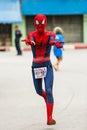 Fancy running athlete in mini-marathon race