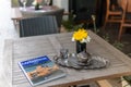 Fancy set table with flowers outside hotel