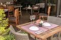 Fancy set table with flowers outside hotel