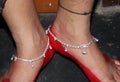 Fancy silver payal wearing a girl , indian traditional anklet foot chain with white colour