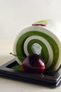 Fancy soap in cake form with cherry on the top Royalty Free Stock Photo