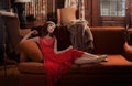 Fancy Woman on Couch Royalty Free Stock Photo