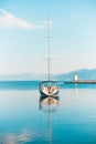 Fancy yacht moored in the harbor of a small town Postira - Croatia, island Brac Royalty Free Stock Photo