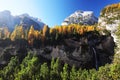 Fanes Waterfall in the Dolomites, in a sunny autumn day.