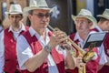 Fanfare singers, ethnic Germans, playing at musical instruments