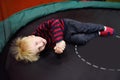 Fanny little boy after activity on trampoline Royalty Free Stock Photo