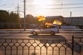 Fans of football club Tula Arsenal celebrate their victory by riding a car through the city with flags of the club Royalty Free Stock Photo