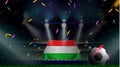 Fans hold the flag of Hungary among silhouette of crowd audience in soccer stadium with confetti to celebrate football game. Royalty Free Stock Photo