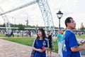 Fans of Japan national team in branded t-shirts and national f