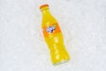 Fanta orange lemonade soft drink bottle ice cubes