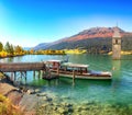 Fantasic autumn view of submerged bell tower in lake Resia