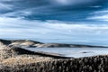 Fantastic aerial infrared view of mountain landscape with sea of