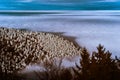 Fantastic aerial infrared view of mountain landscape with sea of