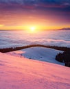 Fantastic air view of the valley covered with dense fog. Location Carpathian mountain, Ukraine, Europe Royalty Free Stock Photo