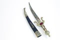 Fantastic arabic dagger with ornaments on isolated background