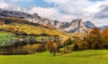 Fantastic autumn scenery on the Grundlsee lake. Amazing Landscape with perfect sky over the lake and Dead Mountains, over the lake Royalty Free Stock Photo