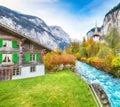 Fantastic autumn view of Lauterbrunnen village with awesome waterfall  Staubbach  and Swiss Alps in the background Royalty Free Stock Photo