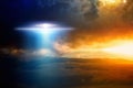 Extraterrestrial aliens spaceship in red glowing sky Royalty Free Stock Photo