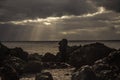 Fantastic big rocks and ocean waves at sundown time. Dramatic scene. Beauty world landscape Royalty Free Stock Photo