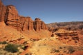 Fantastic clay castles in the sandy desert of the red canyon Konorchek, in Kyrgyzstan Royalty Free Stock Photo