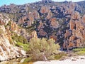 The cliffs and rock formations of Polyaigos, an island of the Greek Cyclades Royalty Free Stock Photo