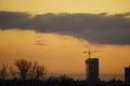 Fantastic Dramatic bright Sunny sunset over the industrial city. Silhouette of City. Selective Focus. Beautiful Natural Royalty Free Stock Photo