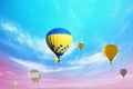 Fantastic dreams. Hot air balloons in bright sky with clouds Royalty Free Stock Photo