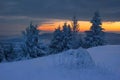 Fantastic evening winter landscape. Dramatic overcast sky. Creative collage.