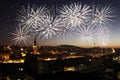 Fantastic fireworks above skyline of the city