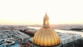 Fantastic flight on drone around the colonnade of St. Isaac`s Cathedral in St. Petersburg at sunset