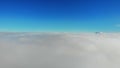 Fantastic flight over fluffy white clouds. Hyperlapse Royalty Free Stock Photo