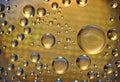 Fantastic gold drops of water on glass Royalty Free Stock Photo