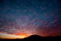 Fantastic gradient blue sundown cloudscape, mountain silhouette