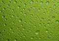 Fantastic green drops of water on glass Royalty Free Stock Photo