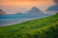 Fantastic marine scenery. Colorful summer sunrise on Hestur Island.