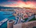 Fantastic morning cityscape of Calvi port. Aerial summer sunrise on Corsica island, France, Europe. Stunning seascape of Mediterra Royalty Free Stock Photo