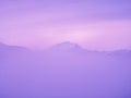 Fantastic mountain covered with purple mist, fabulous surreal inspiration landscape
