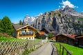 Wooden lodges and flowery gardens in Murren mountain resort, Switzerland