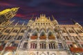 Fantastic night view of facade of Gothic Rathaus or Town Hall of Munich and famous clock tower on Marienplat