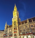Fantastic night view of facade of Gothic Rathaus or Town Hall of Munich and famous clock tower on Marienplat