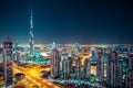 Fantastic nighttime Dubai skyline with illuminated skyscrapers. Royalty Free Stock Photo